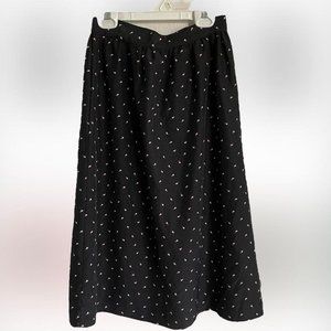 vintage black skirt with cute purple petal design